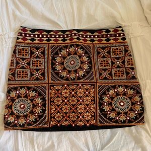 Black embroidered mini skirt